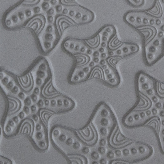 Texture Tile - Jeweled Starfish sample rolled into clay