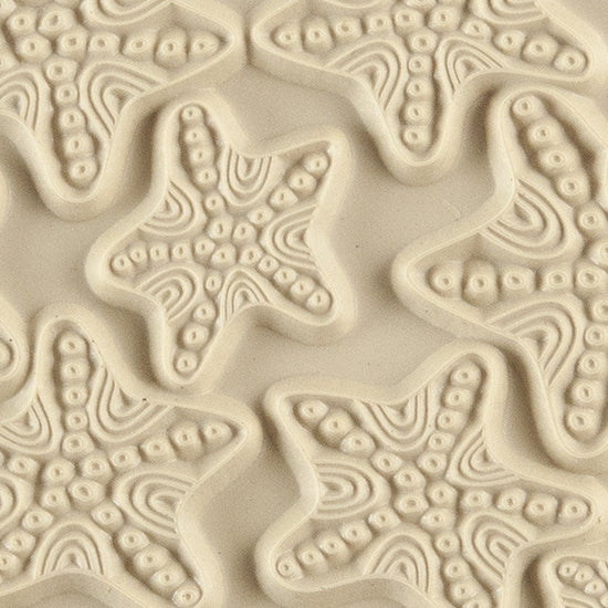 Texture Tile - Jeweled Starfish. Beige Texture Tiles are flexible, washable and can be used with any soft clay. Spritz with CoolSlip or dust on Dry Powder Release for stick-free impressions when using metal clay and polymer clay.