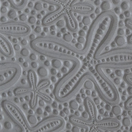 Texture Tile - Cosmic Starfish sample rolled into clay