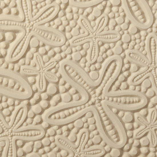 Texture Tile - Cosmic Starfish. Beige Texture Tiles are flexible, washable and can be used with any soft clay. Spritz with CoolSlip or dust on Dry Powder Release for stick-free impressions when using metal clay and polymer clay.