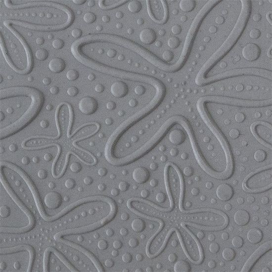 Texture Tile - Cosmic Starfish Embossed sample rolled into clay