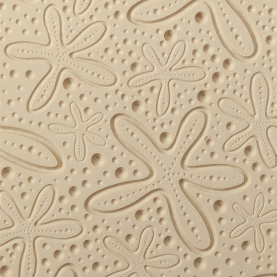 Texture Tile - Cosmic Starfish Embossed. Beige Texture Tiles are flexible, washable and can be used with any soft clay. Spritz with CoolSlip or dust on Dry Powder Release for stick-free impressions when using metal clay and polymer clay.