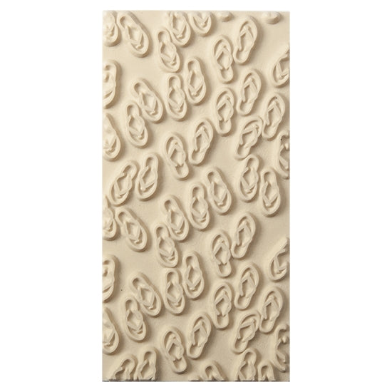 Texture Tile - The Flips and the Flops. Beige Texture Tiles are flexible, washable and can be used with any soft clay. Spritz with CoolSlip or dust on Dry Powder Release for stick-free impressions when using metal clay and polymer clay.