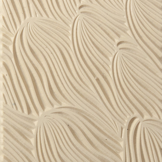 Texture Tile - Sea Current. Beige Texture Tiles are flexible, washable and can be used with any soft clay. Spritz with CoolSlip or dust on Dry Powder Release for stick-free impressions when using metal clay and polymer clay.