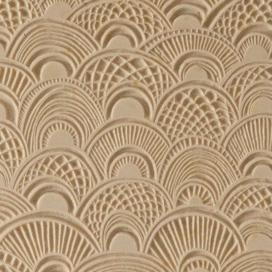 Texture Tile - Seashell Sunrise. Beige Texture Tiles are flexible, washable and can be used with any soft clay. Spritz with CoolSlip or dust on Dry Powder Release for stick-free impressions when using metal clay and polymer clay.