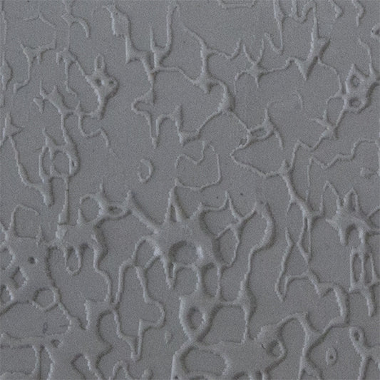 Texture Tile - Dark Water sample rolled into clay