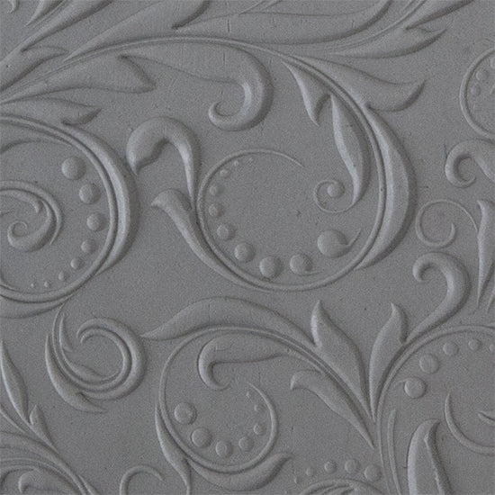 Texture Tile - Leaves and Dots Embossed sample rolled into clay