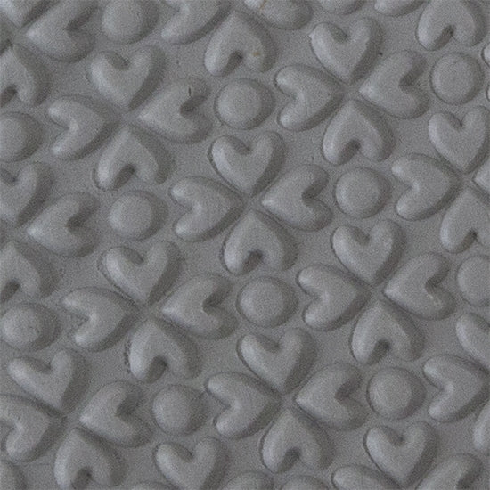 Texture Tile - Lucky Hearts Embossed sample rolled into clay