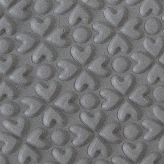 Texture Tile - Lucky Hearts Embossed sample rolled into clay