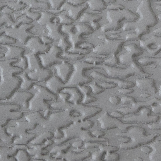 Texture Tile - Dark Water Embossed sample rolled into clay