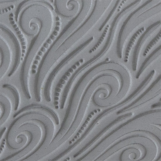 Texture Tile - Whimsical Wind sample rolled into clay