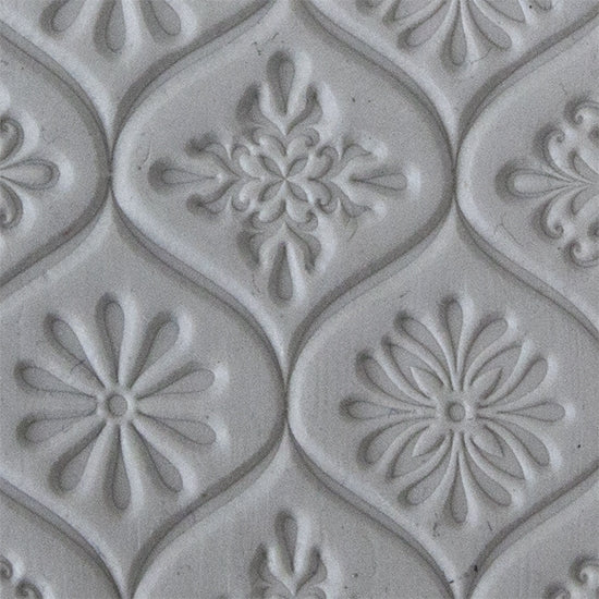 Texture Tile - Woven Daisies sample rolled into clay