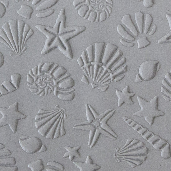 Texture Tile - Seashells sample rolled into clay