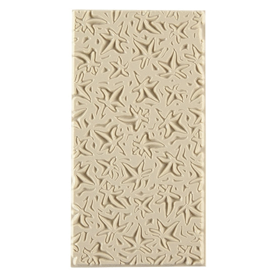 Texture Tile - Woodcut Leaves Embossed. Beige Texture Tiles are flexible, washable and can be used with any soft clay. Spritz with CoolSlip or dust on Dry Powder Release for stick-free impressions when using metal clay and polymer clay.