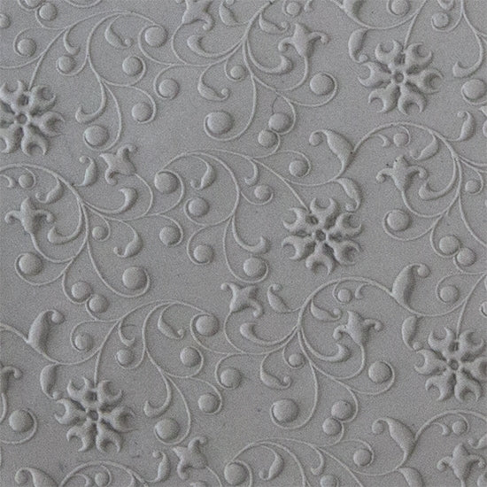 Texture Tile - Floral Curls Embossed sample rolled into clay