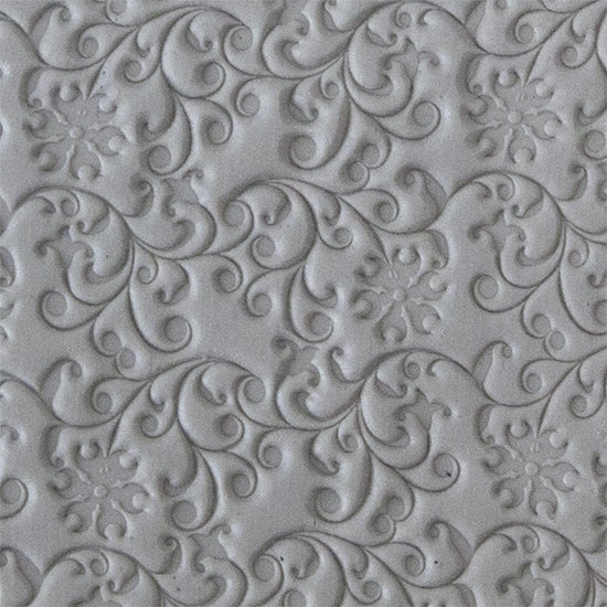 Texture Tile - Floral Curls sample rolled into clay