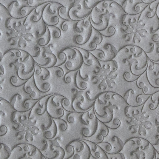 Texture Tile - Floral Curls sample rolled into clay