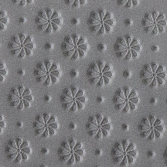 Texture Tile - Field of Daisies sample rolled into clay