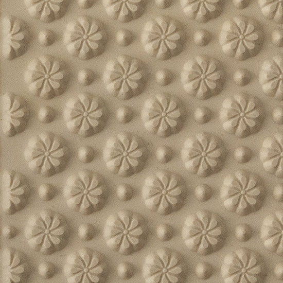 Texture Tile - Field of Daisies. Beige Texture Tiles are flexible, washable and can be used with any soft clay. Spritz with CoolSlip or dust on Dry Powder Release for stick-free impressions when using metal clay and polymer clay.