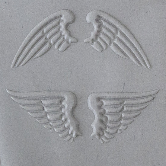 Texture Tile - Natural Wings Embossed sample rolled into clay