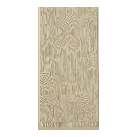 Texture Tile - Wood Grain Love. Beige Texture Tiles are flexible, washable and can be used with any soft clay. Spritz with CoolSlip or dust on Dry Powder Release for stick-free impressions when using metal clay and polymer clay.