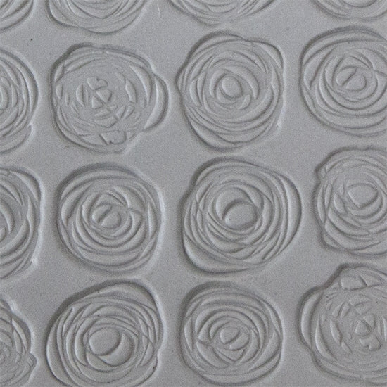 Texture Tile - Tissue Flowers sample rolled into clay