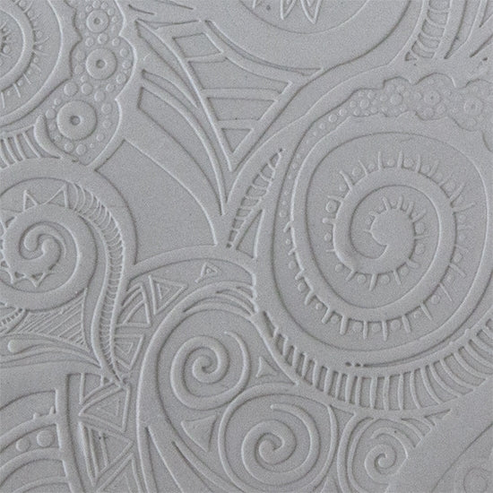 Texture Tile - Swirly Hearts Embossed sample rolled into clay