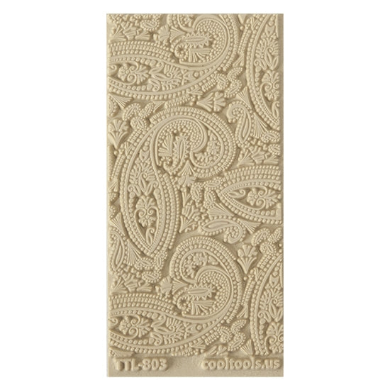 Texture Tile - Mehndi Paisley. Beige Texture Tiles are flexible, washable and can be used with any soft clay. Spritz with CoolSlip or dust on Dry Powder Release for stick-free impressions when using metal clay and polymer clay.