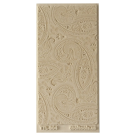 Texture Tile - Mehndi Paisley Fineline. Beige Texture Tiles are flexible, washable and can be used with any soft clay. Spritz with CoolSlip or dust on Dry Powder Release for stick-free impressions when using metal clay and polymer clay.