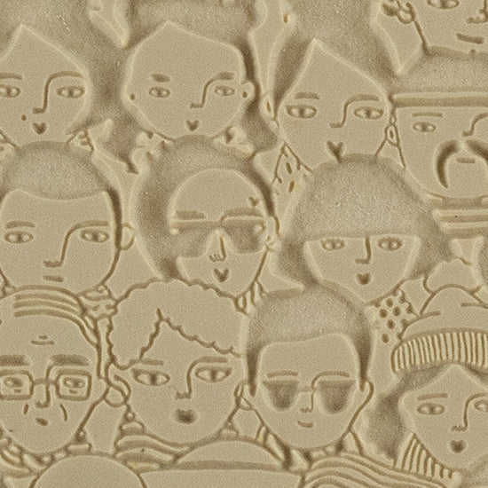 Texture Tile - A Face in the Crowd Embossed. Beige Texture Tiles are flexible, washable and can be used with any soft clay. Spritz with CoolSlip or dust on Dry Powder Release for stick-free impressions when using metal clay and polymer clay.