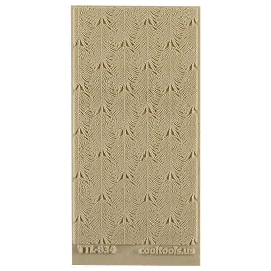 Texture Tile - Hawaiian Sun. Beige Texture Tiles are flexible, washable and can be used with any soft clay. Spritz with CoolSlip or dust on Dry Powder Release for stick-free impressions when using metal clay and polymer clay.