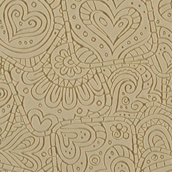 Texture Tile - Doodling Hearts Fineline. Beige Texture Tiles are flexible, washable and can be used with any soft clay. Spritz with CoolSlip or dust on Dry Powder Release for stick-free impressions when using metal clay and polymer clay.