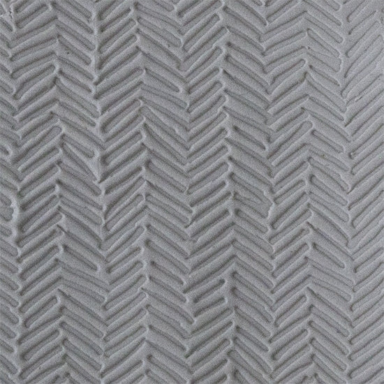 Texture Tile - Smudged Herringbone sample rolled into clay