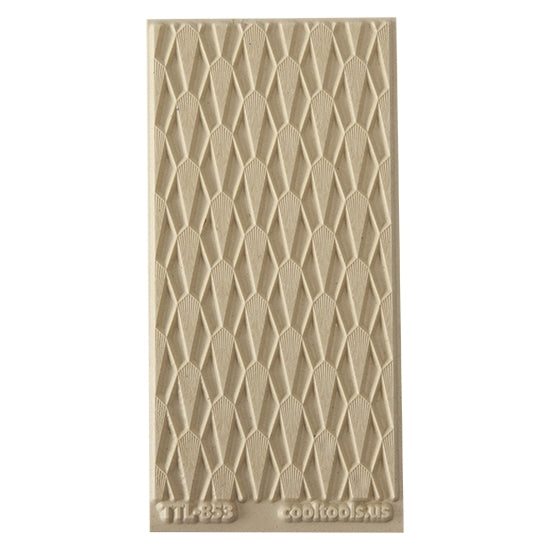 Texture Tile - Dove Tails. Beige Texture Tiles are flexible, washable and can be used with any soft clay. Spritz with CoolSlip or dust on Dry Powder Release for stick-free impressions when using metal clay and polymer clay.