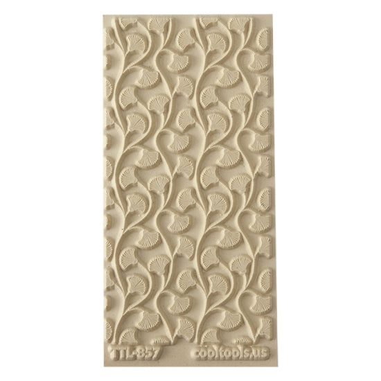 Texture Tile - Dotted Vines. Beige Texture Tiles are flexible, washable and can be used with any soft clay. Spritz with CoolSlip or dust on Dry Powder Release for stick-free impressions when using metal clay and polymer clay.