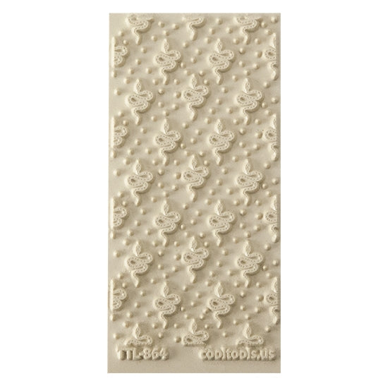 Texture Tile - Boho Snakes. Beige Texture Tiles are flexible, washable and can be used with any soft clay. Spritz with CoolSlip or dust on Dry Powder Release for stick-free impressions when using metal clay and polymer clay.