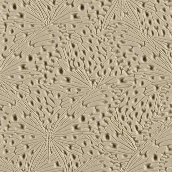 Texture Tile - Butterfly Wings Embossed. Beige Texture Tiles are flexible, washable and can be used with any soft clay. Spritz with CoolSlip or dust on Dry Powder Release for stick-free impressions when using metal clay and polymer clay.