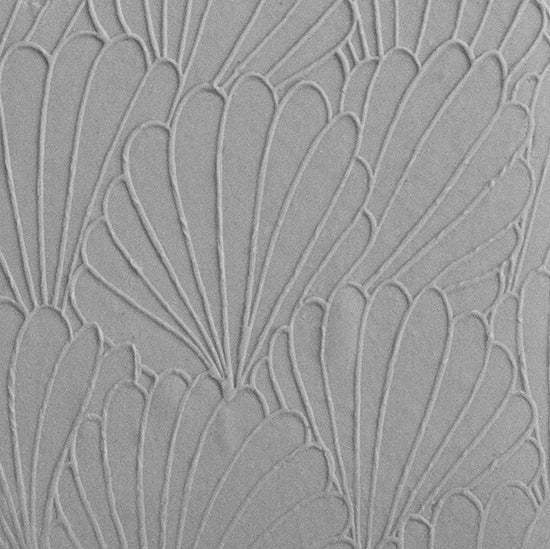 Texture Tile - In the Current Embossed sample rolled into clay