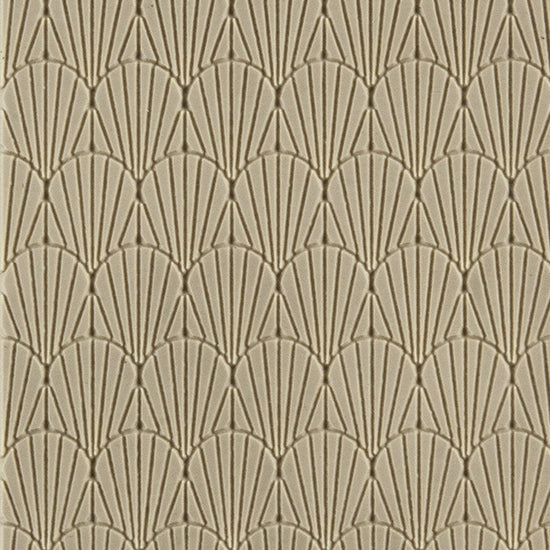 Texture Tile - Deco Shells Embossed. Beige Texture Tiles are flexible, washable and can be used with any soft clay. Spritz with CoolSlip or dust on Dry Powder Release for stick-free impressions when using metal clay and polymer clay.