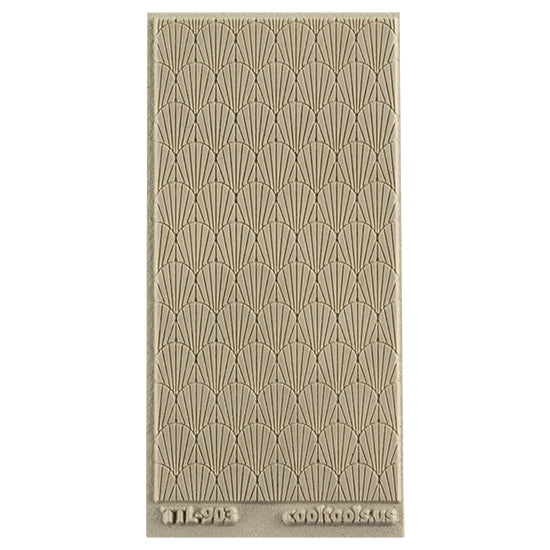 Texture Tile - Deco Shells Embossed. Beige Texture Tiles are flexible, washable and can be used with any soft clay. Spritz with CoolSlip or dust on Dry Powder Release for stick-free impressions when using metal clay and polymer clay.