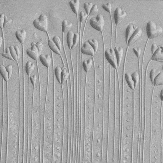 Texture Tile - Hearts in Bloom Embossed sample rolled into clay