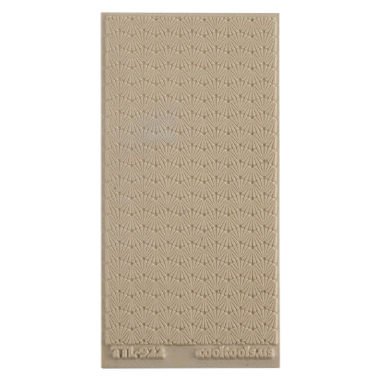 Texture Tile - Waved Scallops. Beige Texture Tiles are flexible, washable and can be used with any soft clay. Spritz with CoolSlip or dust on Dry Powder Release for stick-free impressions when using metal clay and polymer clay.