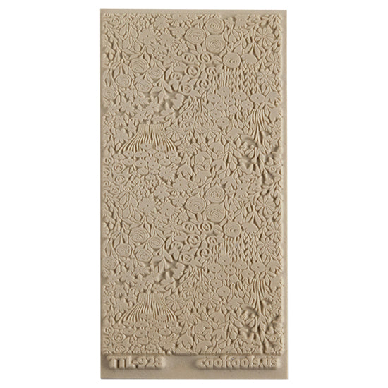 Texture Tile - Field of Flowers. Beige Texture Tiles are flexible, washable and can be used with any soft clay. Spritz with CoolSlip or dust on Dry Powder Release for stick-free impressions when using metal clay and polymer clay.