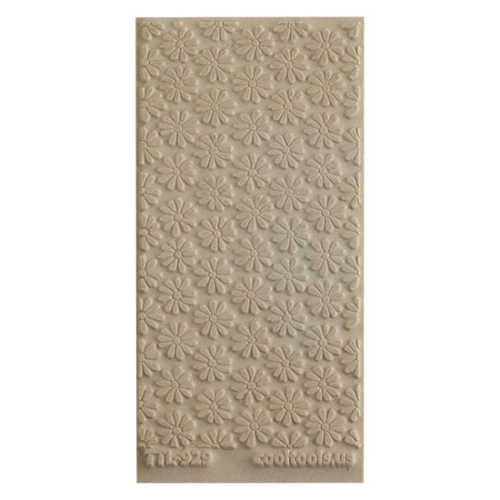 Texture Tile - Upsy Daisy. Beige Texture Tiles are flexible, washable and can be used with any soft clay. Spritz with CoolSlip or dust on Dry Powder Release for stick-free impressions when using metal clay and polymer clay.