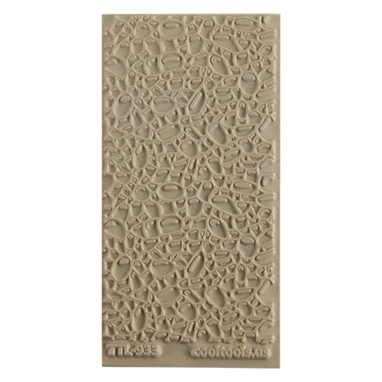 Texture Tile - Cobblestone. Beige Texture Tiles are flexible, washable and can be used with any soft clay. Spritz with CoolSlip or dust on Dry Powder Release for stick-free impressions when using metal clay and polymer clay.