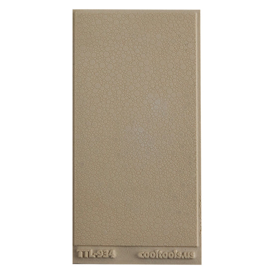 Texture Tile - Suds. Beige Texture Tiles are flexible, washable and can be used with any soft clay. Spritz with CoolSlip or dust on Dry Powder Release for stick-free impressions when using metal clay and polymer clay.