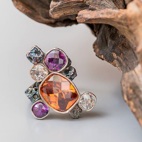 Ring shown was created by Alexander Kraft using Cool Tools Cubic Zirconia and EZ960® Sterling Silver Clay. Stones include: Champagne Barrel Checkerboard, Amethyst Cushion Checkerboard and White Diamond Cushion Checkerboard with driftwood