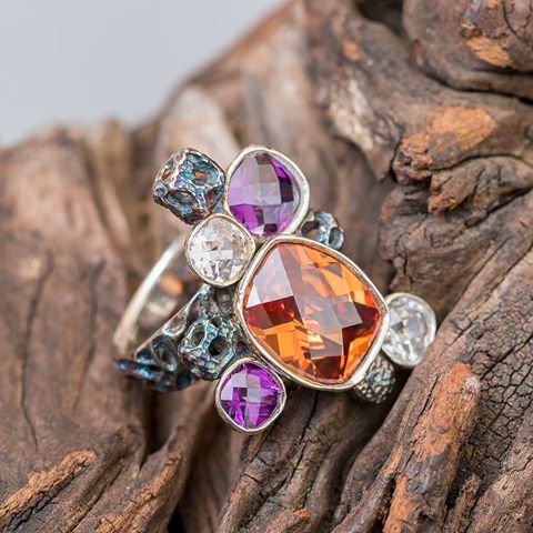      Ring shown was created by Alexander Kraft using Cool Tools Cubic Zirconia and EZ960® Sterling Silver Clay. Stones include: Champagne Barrel Checkerboard, Amethyst Cushion Checkerboard and White Diamond Cushion Checkerboard on driftwood